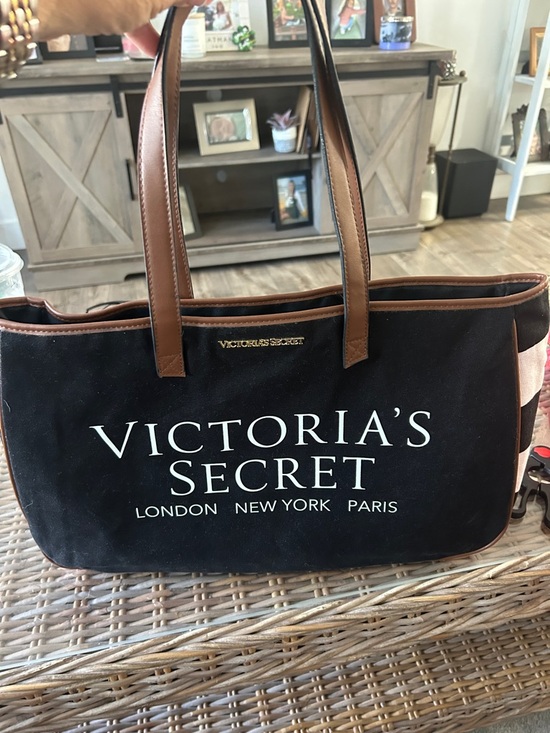 Victoria's Secret Handbags - Victoria's Secret Black Tote with Brown Handles